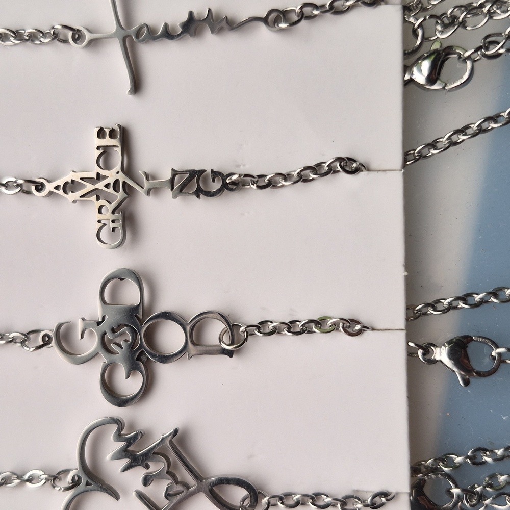 Four Silver Religious Charms Necklaces, With A Bracelet